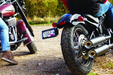Kuryakyn 3142 Nova Side Mount License Plate Frame Gloss Black - User 1