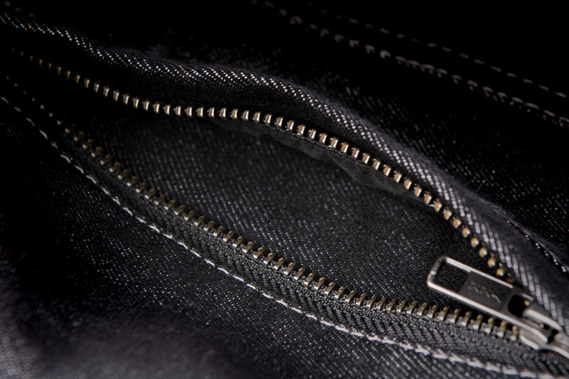 Detail zipper shot of black Iron Sights Club Collar Denim Vest