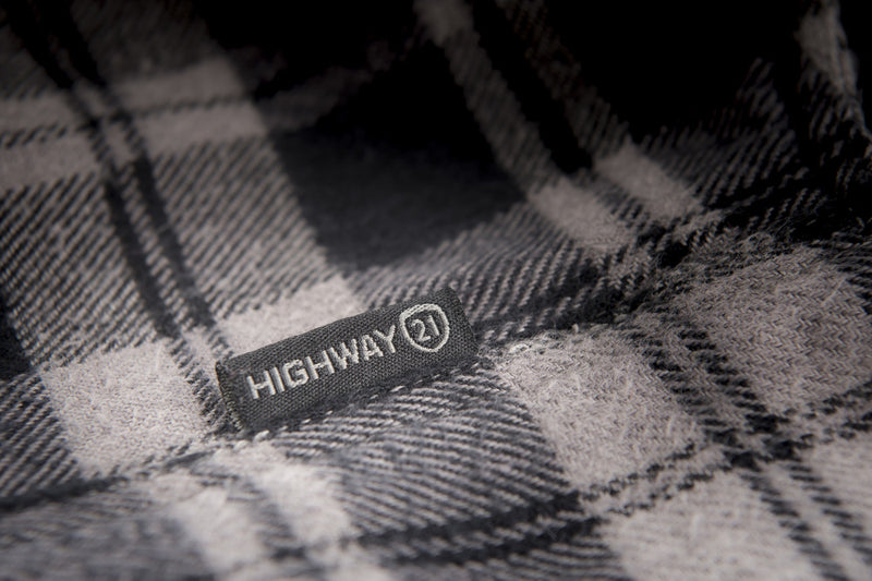 Highway 21 label on the black and grey Marksman Flannel