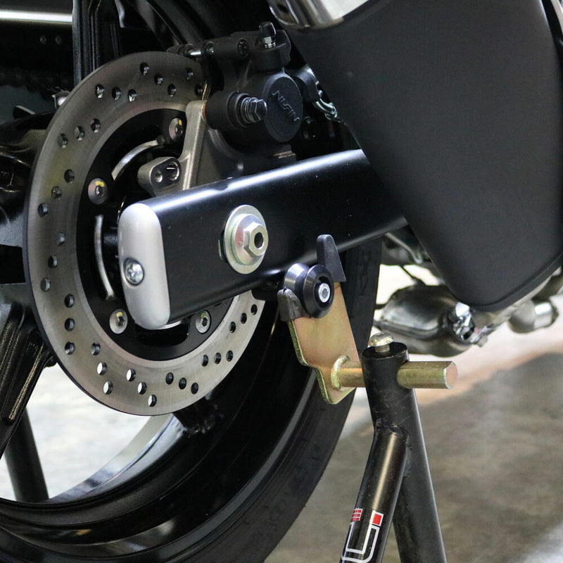 Shogun Swingarm Sliders Black - 701-0379 Suzuki 650 2017-2023