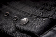 Primer jacket in black showcasing button clasp