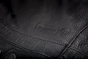Primer jacket in black showcasing leather material